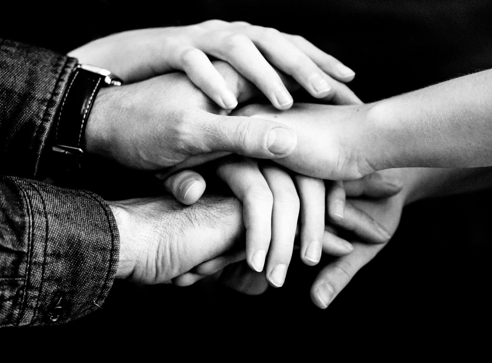 group-of-hands-piled-together-in-unity-2026-03-17-21-29-38-utc (1)