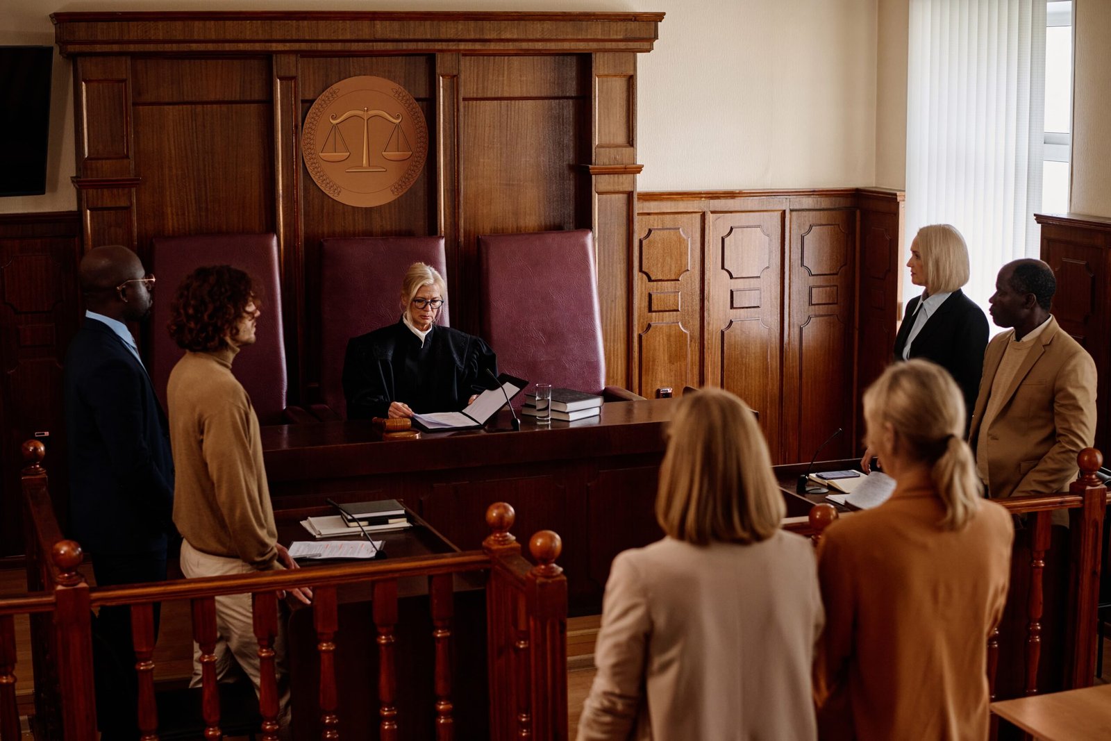 judge-presiding-over-court-case-with-lawyers-2026-01-08-05-58-57-utc (1)